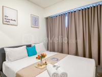 Homey and Good 2BR at Meikarta Apartment By Travelio