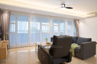 Homey and Spacious 3BR Grand Tropic Apartment By Travelio