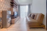 Warm and Cozy 1BR at Casa de Parco Apartment By Travelio