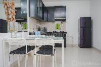 Strategic and Homey 2BR at Puri Garden Apartment near Mall By Travelio