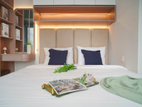 Warm Wooden Touch 2BR at Apartment Emerald Bintaro By Travelio