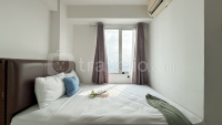 Cozy Stay and Comfort 2BR at Bassura City Apartment By Travelio