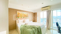 Great City View Studio at Tamansari The Hive Apartment By Travelio