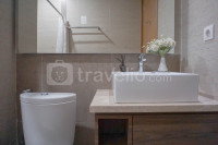 Apartemen Grande Valore Condominium - Wonderful and Pool View 1BR Apartment Grande Valore Condominium By Travelio