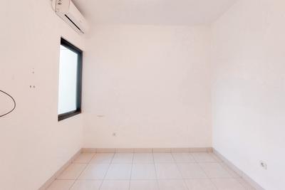 Apartemen Eco Home Residence - Comfy Unfurnished Studio Apartment with AC at Eco Home Residence By Travelio