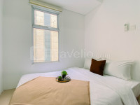 Compact White 2BR near Rawa Buaya Station at Vittoria Residence By Travelio