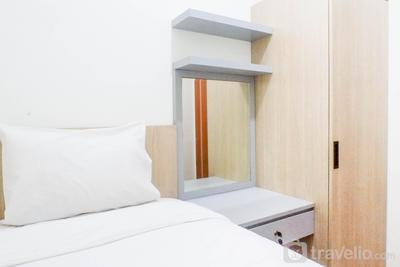 Apartemen Puncak Dharmahusada - Exquisite 2BR Apartment at Puncak Dharmahusada By Travelio