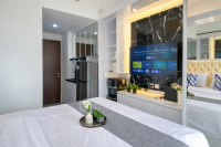 Comfy White Studio at Transpark Juanda Bekasi Timur Apartment By Travelio