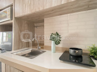Apartemen Vasanta Innopark - Woodtone Studio at Vasanta Innopark Apartment  By Travelio