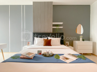Modern Monochromatic 2BR near LRT Station at Apartment Samara Suites By Travelio