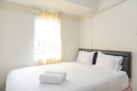 Homey and Modern 2BR at Pluit Sea View Apartment By Travelio