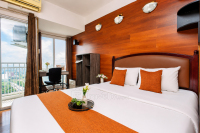Apartemen Grand Dhika City - Homey Wooden Touch Studio Room at Apartment Grand Dhika City By Travelio