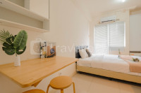 Cozy Studio with Direct Access to Mall Green Pramuka City Apartment By Travelio