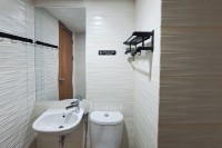 Apartemen Cisauk Point - Warm Wooden Touch Studio Room at Apartment Cisauk Point By Travelio