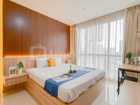 Spacious and Warm 2BR at Ciputra World 2 Apartment By Travelio