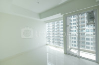 Unfurnished Studio with AC at 16th Floor Green Sedayu Apartment By Travelio