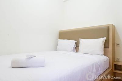 Apartemen Puncak Dharmahusada - Exquisite 2BR Apartment at Puncak Dharmahusada By Travelio