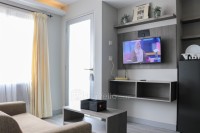 Grey Toned 2BR Apartment at Grand Asia Afrika By Travelio