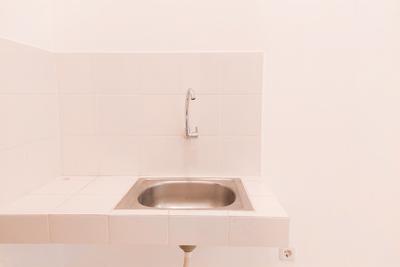 Apartemen Eco Home Residence - Comfy Unfurnished Studio Apartment with AC at Eco Home Residence By Travelio