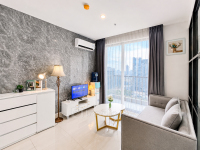 Homey and Warm 1BR at Ciputra World 2 Apartment By Travelio