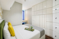 Comfy and Elegant 2BR Apartment at Woodland Park Residence By Travelio