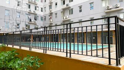 Apartemen East Park - Cozy Studio Unfurnished with AC at East Park Apartment By Travelio