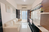 2BR Connected to Pakuwon Mall at Orchard Supermall Mansion Apartment By Travelio