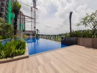 Apartemen Marigold Nava Park - Modern Wood Accent 2BR at Marigold Nava Park Apartment By Travelio