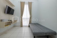 Comfy and Homey 2BR at Patraland Urbano Apartment By Travelio