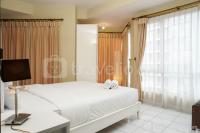 Comfy and Minimalist 2BR Apartment at 18 Residence Taman Rasuna By Travelio