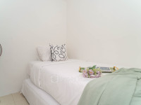 Neat and Nice 2BR at Apartment Bassura City By Travelio