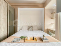 Apartemen Vasanta Innopark - Woodtone Studio at Vasanta Innopark Apartment  By Travelio
