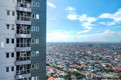 Apartemen Puncak Dharmahusada - Exquisite 2BR Apartment at Puncak Dharmahusada By Travelio