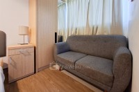 Apartemen Cisauk Point - Warm Wooden Touch Studio Room at Apartment Cisauk Point By Travelio