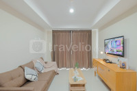 Serene and Homey 1BR Apartment at Nine Residence By Travelio