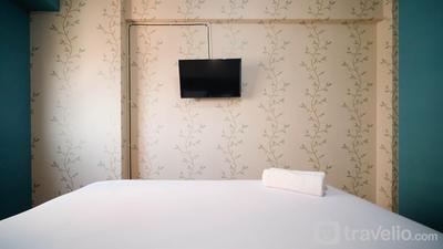 Apartemen Puncak Dharmahusada - Homey 2BR with Extra Room at Puncak Dharmahusada Apartment By Travelio