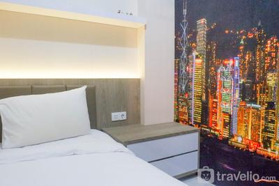 Apartemen Puncak Dharmahusada - Relaxing and Serene 2BR Apartment at Puncak Dharmahusada By Travelio