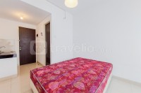 Unfurnished Studio with AC at 2nd Floor Serpong Garden Apartment By Travelio