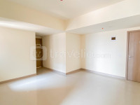 Apartemen Meikarta - Unfurnished 2BR with AC at Living Room Meikarta Apartment By Travelio