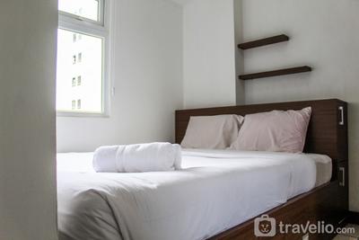 Comfortable and Tranquil 2BR Apartment at Green Pramuka City By Travelio