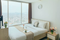 Cozy Studio at Grand Kamala Lagoon Apartment near Mall By Travelio
