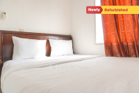 Strategic 2BR Menteng Square Apartment By Travelio