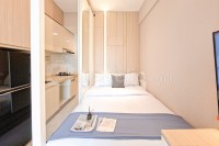 Elegant & Strategic Studio Room at Sky House BSD Apartment By Travelio