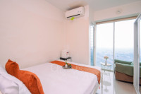 Modern and Homey 1BR without Living Room at Grand Kamala Lagoon Apartment By Travelio