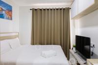 Elegant Studio Apartment at Springwood Residence By Travelio
