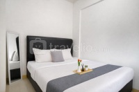 Comfortable and Roomy 2BR at Apartment Green Pramuka City By Travelio