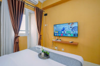 Cozy Stay Studio at Green Pramuka City Apartment By Travelio