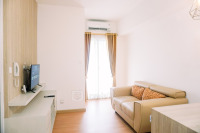 Modern and Homey 2BR Apartment at M-Town Residence By Travelio
