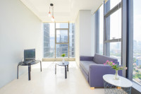 South Tower 2BR at L'Avenue Apartment By Travelio