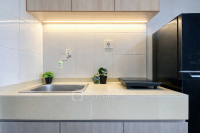 Apartemen Monroe Tower - Wooden Accents Studio at Monroe Tower Apartment By Travelio